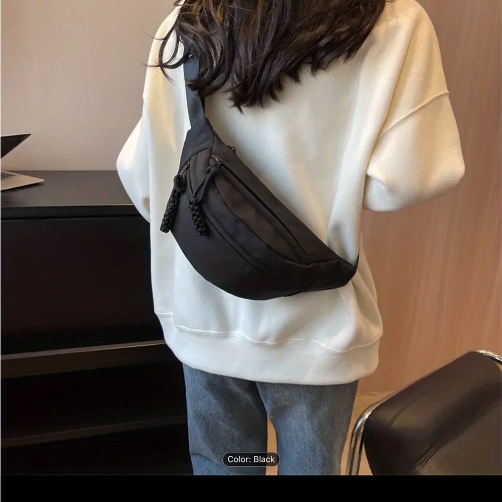 Women’s cross/sling bag.  New, never used